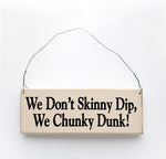 wood sign saying We Don't Skinny Dip, We Chunky Dunk