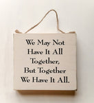 wood sign saying We May Not Have It All Together, But Together We Have It All