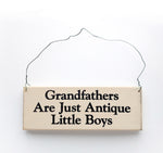 wood sign saying Grandfathers are Just Antique Little Boys