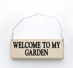 wood sign saying Welcome to my Garden