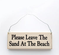 wood sign saying Please Leave the Sand At the Beach