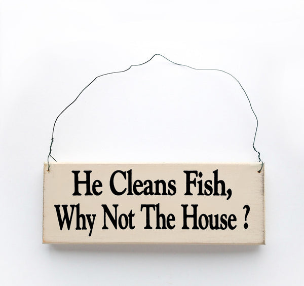 wood sign saying He Cleans Fish, Why Not the House?