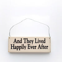 wood sign saying And They Lived Happily Ever After