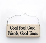 wood sign saying Good Food, Good Friends, Good Times