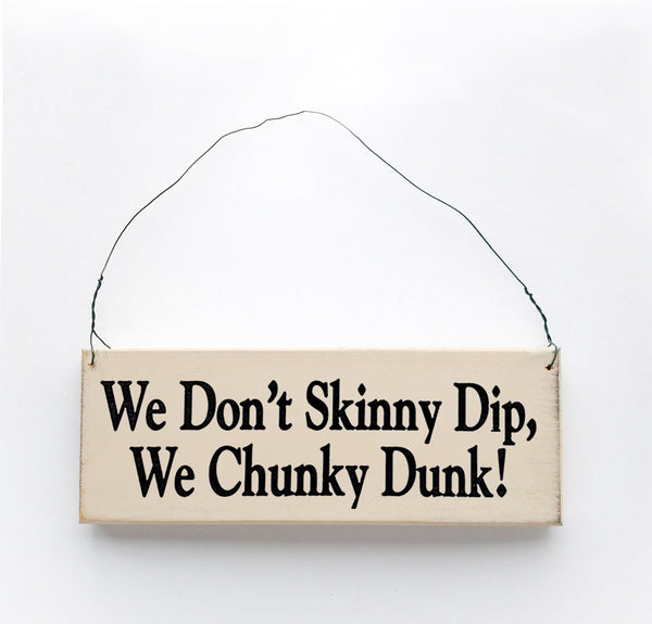 wood sign saying We Don't Skinny Dip, We Chunky Dunk