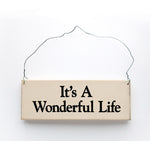 wood sign saying It's a Wonderful Life