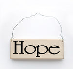 wood sign saying Hope