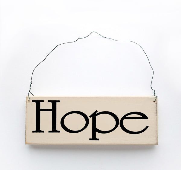 wood sign saying Hope