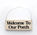 wood sign saying Welcome to Our Porch