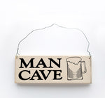wood sign saying Man Cave