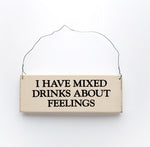 wood sign saying I Have Mixed Drinks About Feelings