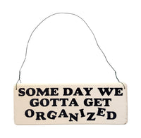 wood sign saying Some Day We Gotta Get Organized
