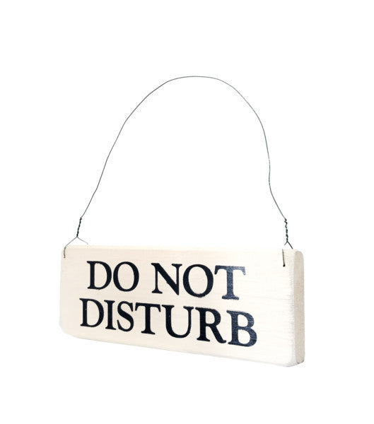 wood sign saying Do Not Disturb