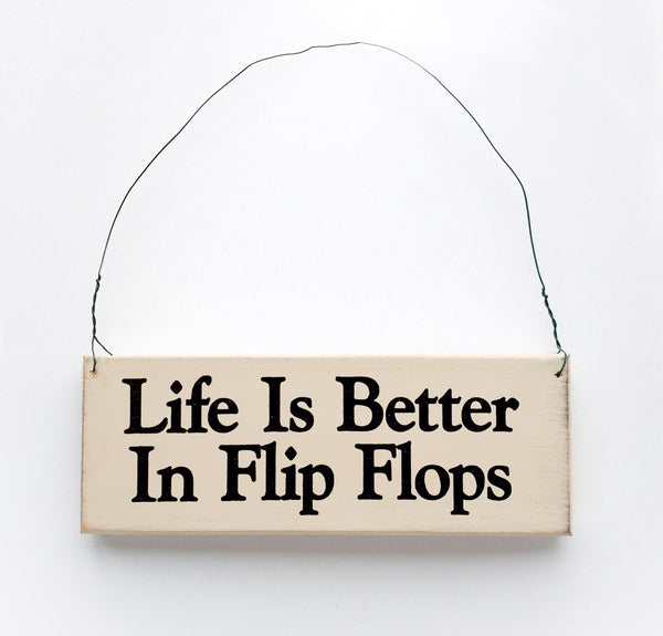 wood sign saying Life Is Better In Flip Flops