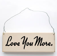 wood sign saying Love You More