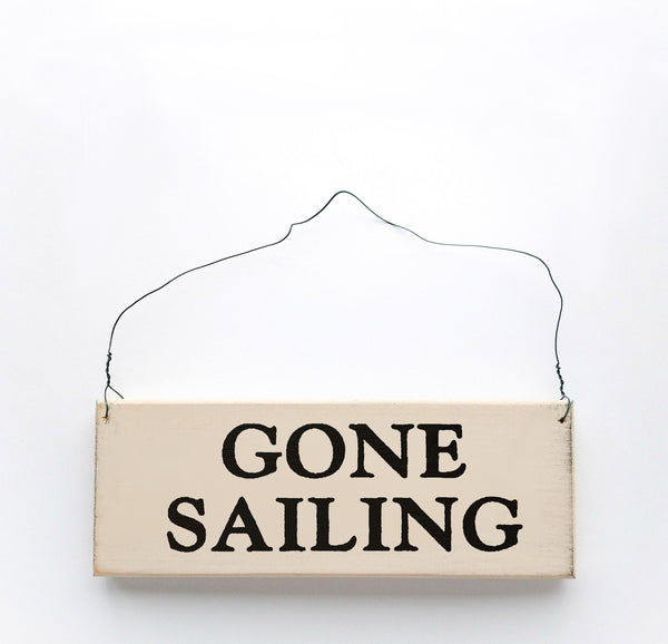 wood sign saying Gone Sailing